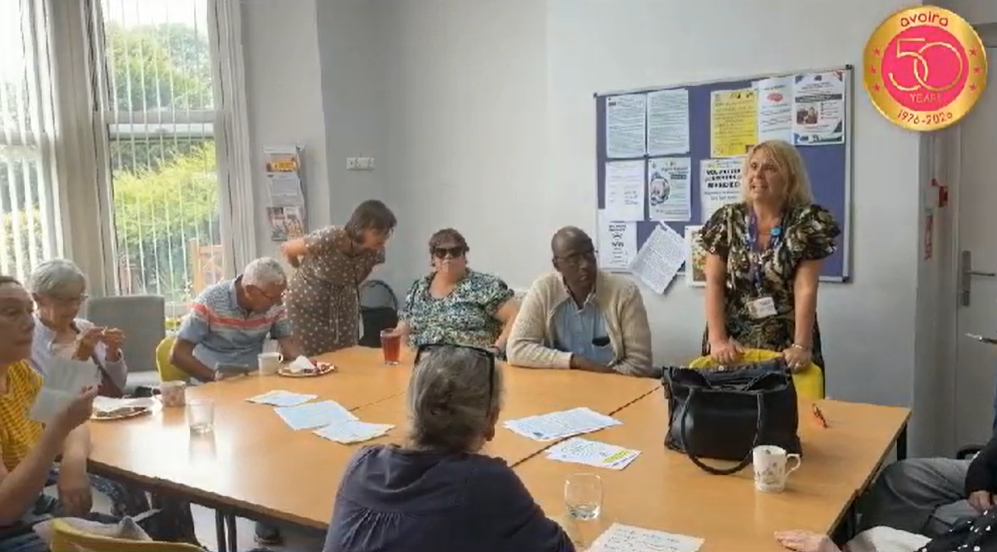 A group sat around a table 